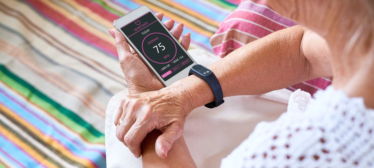 woman looking at her smartwatch